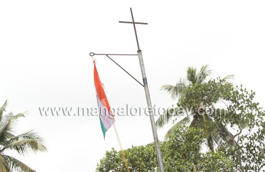 Priest insults national flag